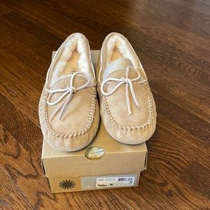 Brand new never worn ugg slippers. With box.